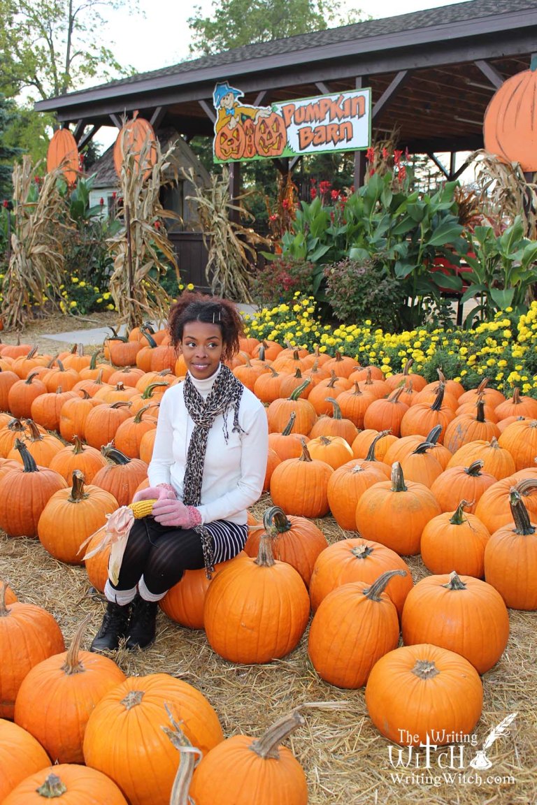 woman at a harvest festival pumpkin farm