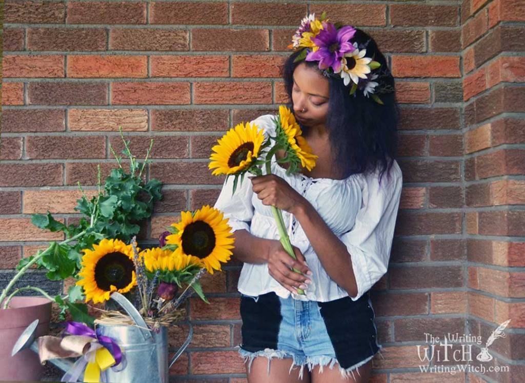 Afura with sunflowers and flower crown